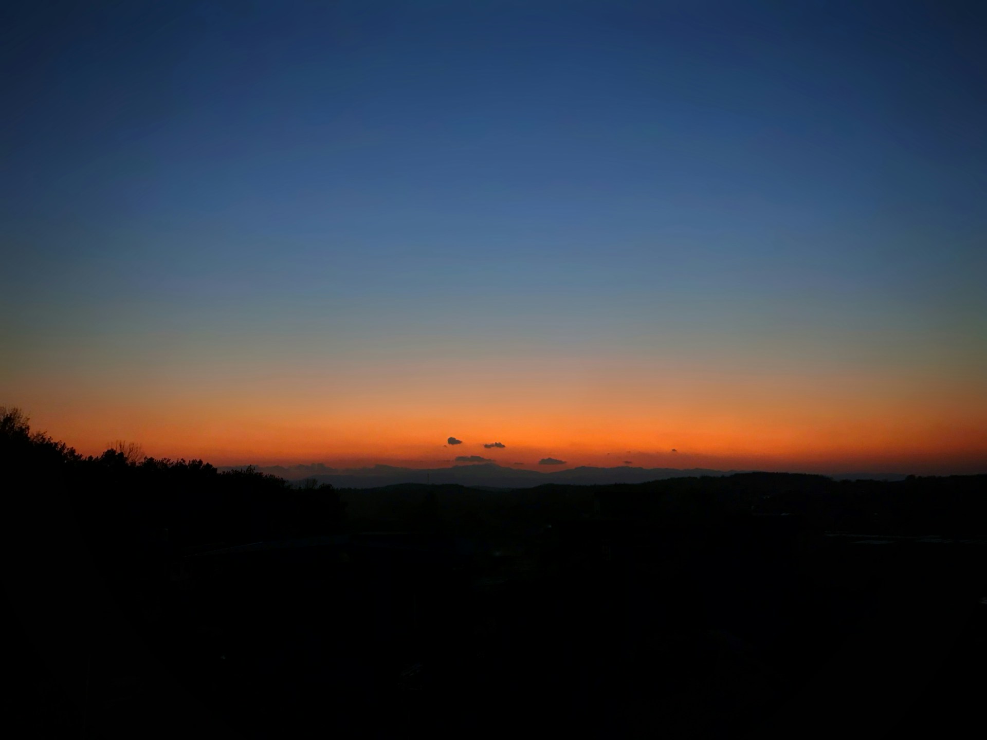 woman wearing yellow long-sleeved dress under white clouds and blue sky during daytime