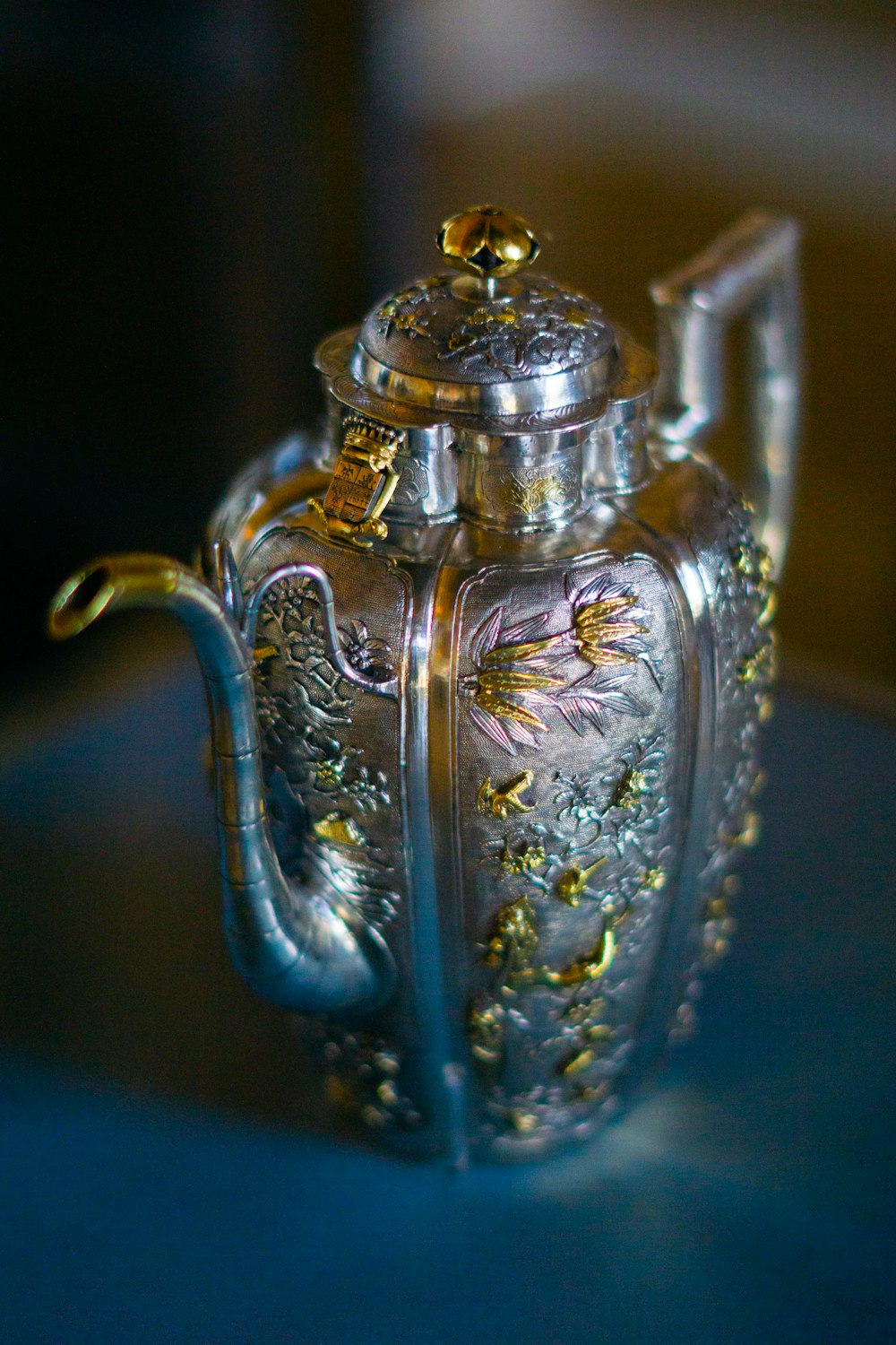 gray and yellow floral stainless steel teapot