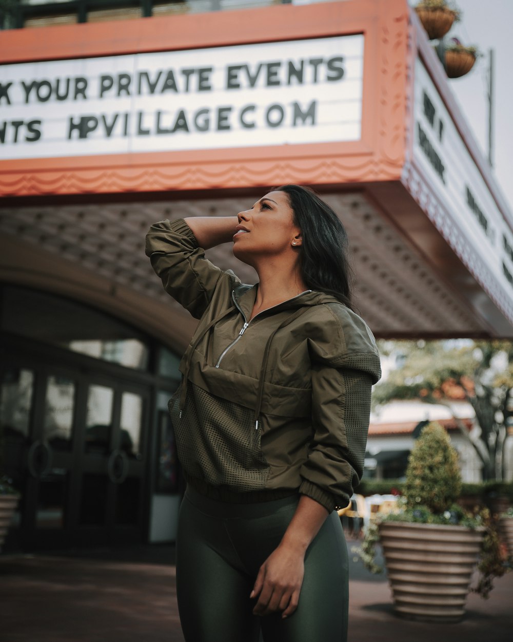 woman in green hoodie jacket