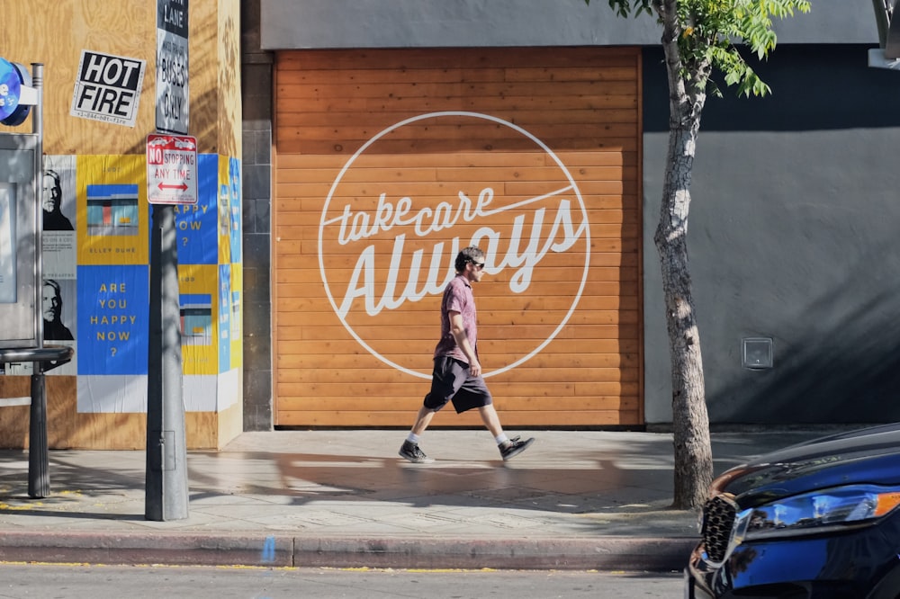 man walking beside take care always shutter door