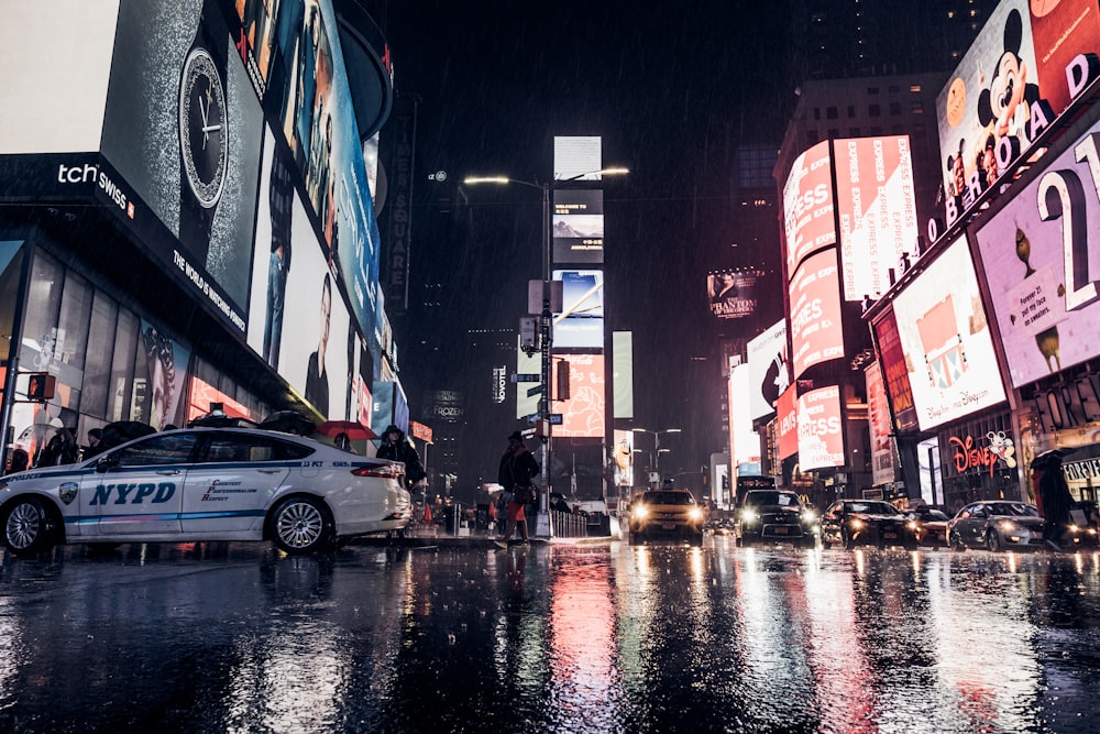 cars on road at night time