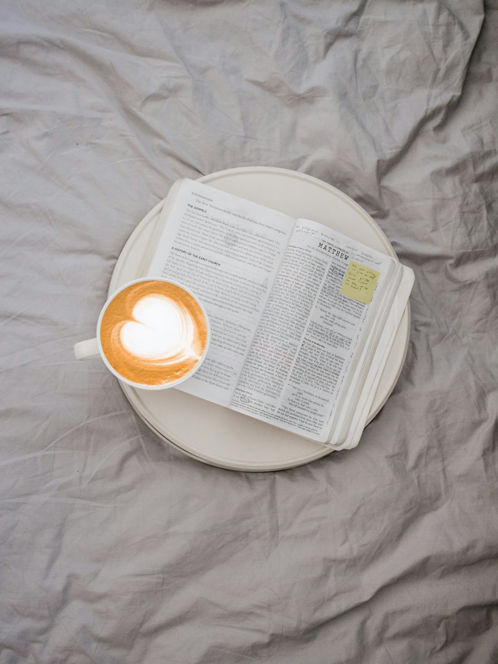 coffee beside open book