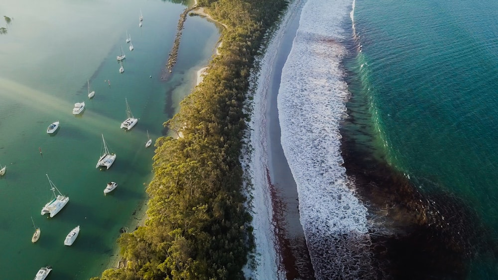 aerial photography of yacht on sea viewing calm sea