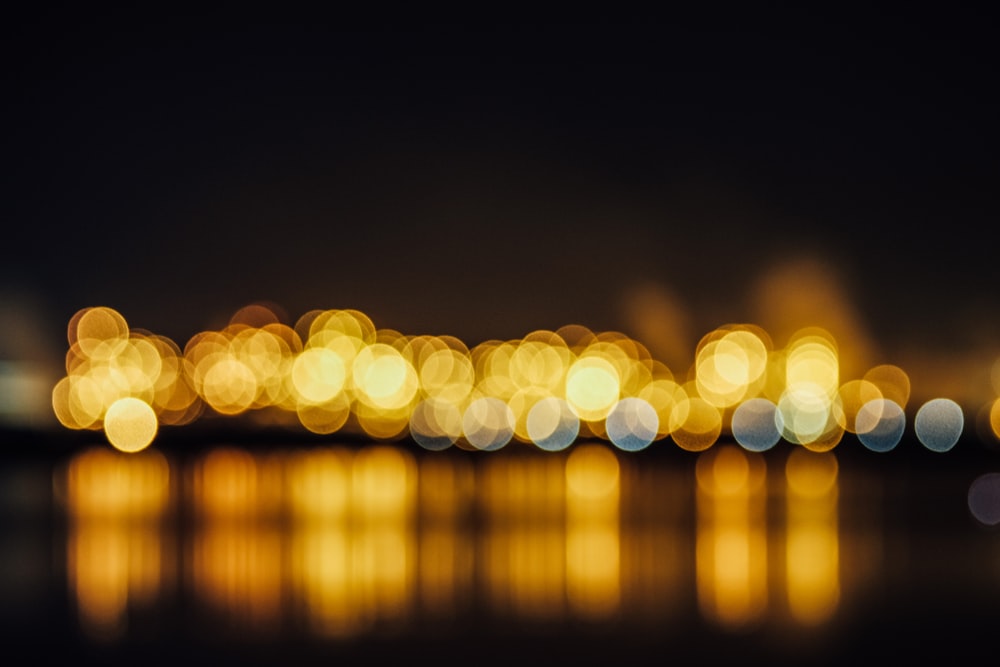 bokeh photography of yellow light