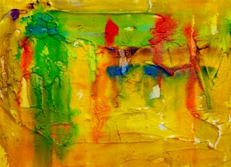 A vibrant yellow abstract painting with bold strokes, symbolizing creativity and energy.
