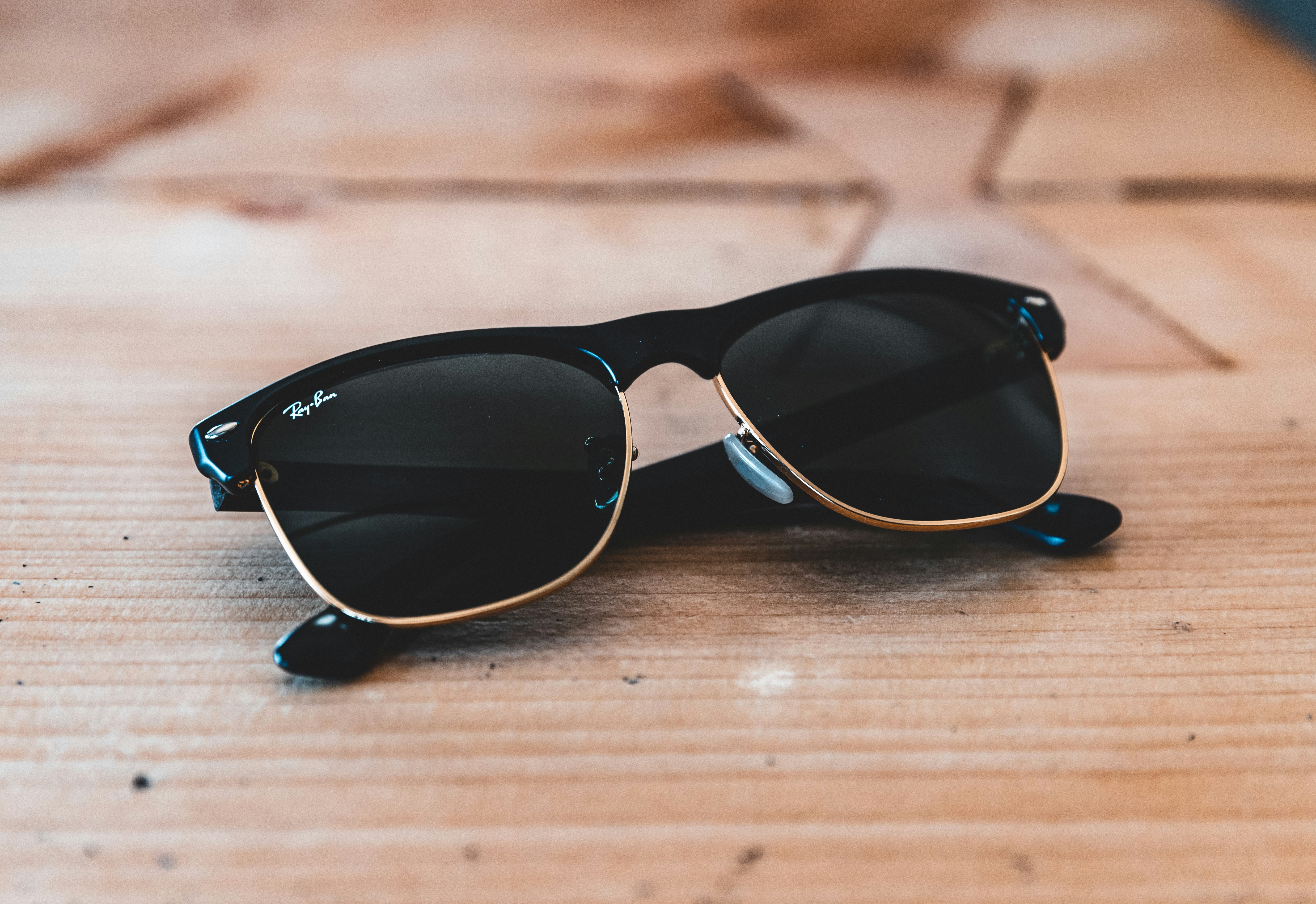 Black Framed Ray Ban Clubmaster Sunglasses Photo Free Grey Image On Unsplash
