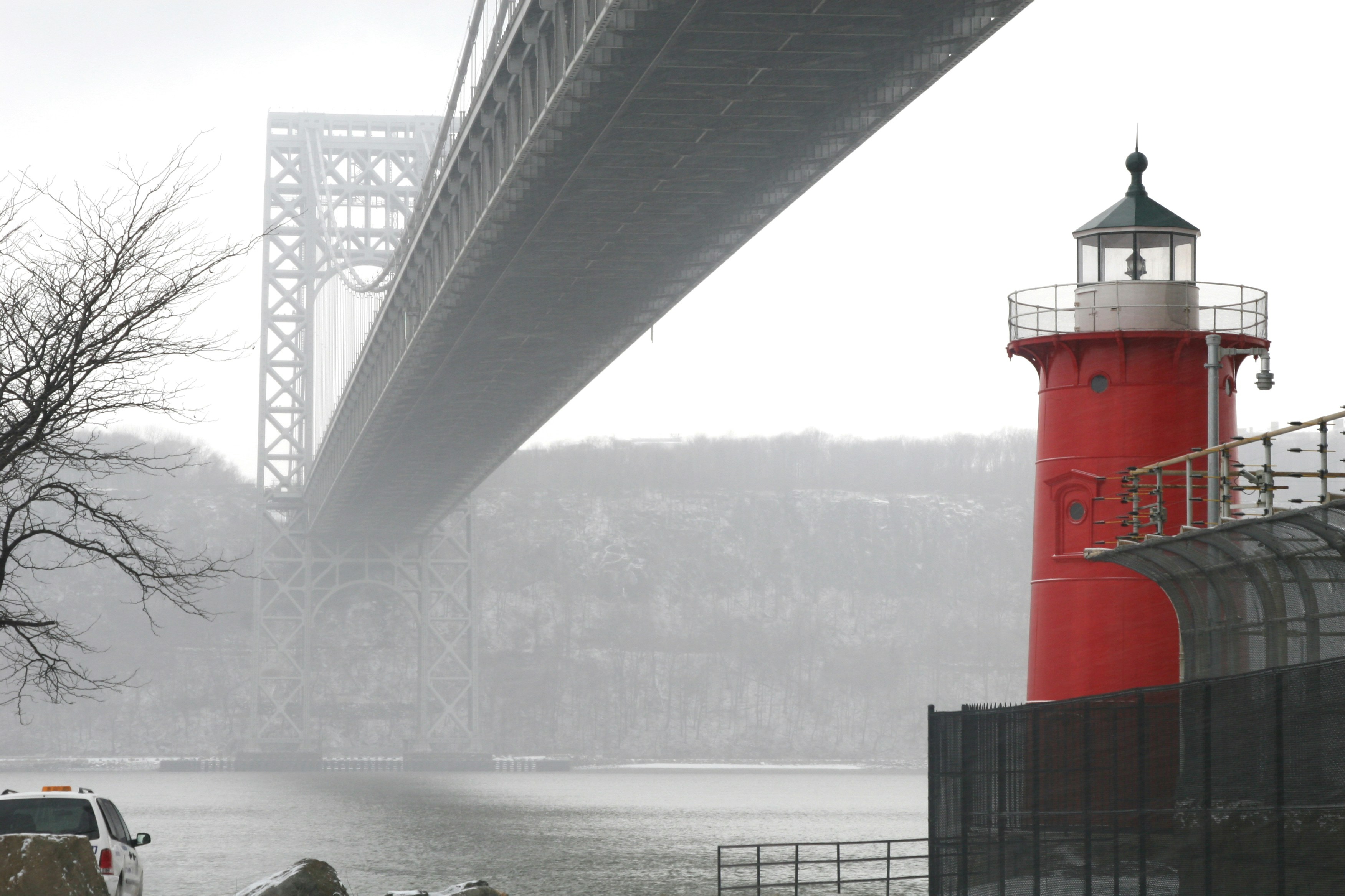 gray steel bridge over body of water