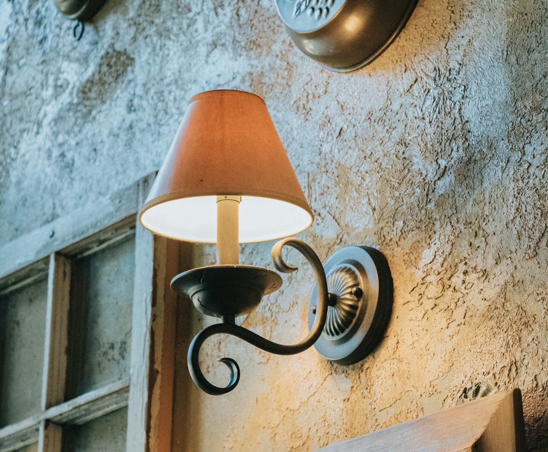 turned-on sconce lamp