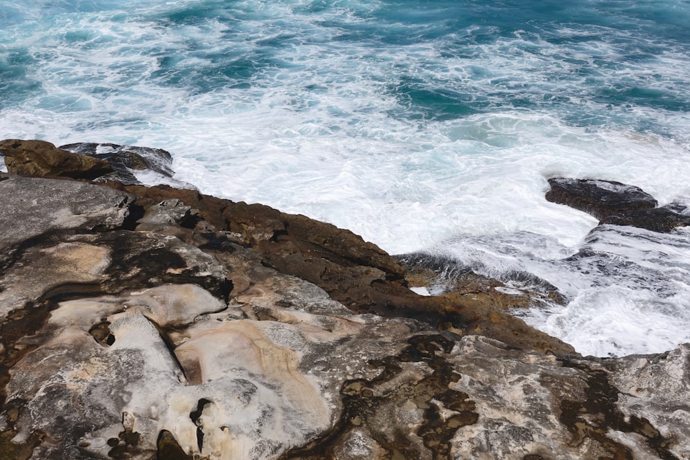 body of water and rocks