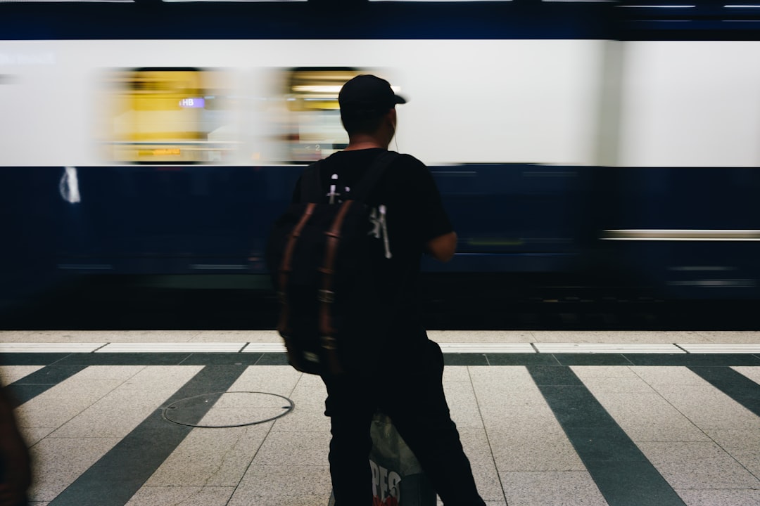 man wearing black fitted cap