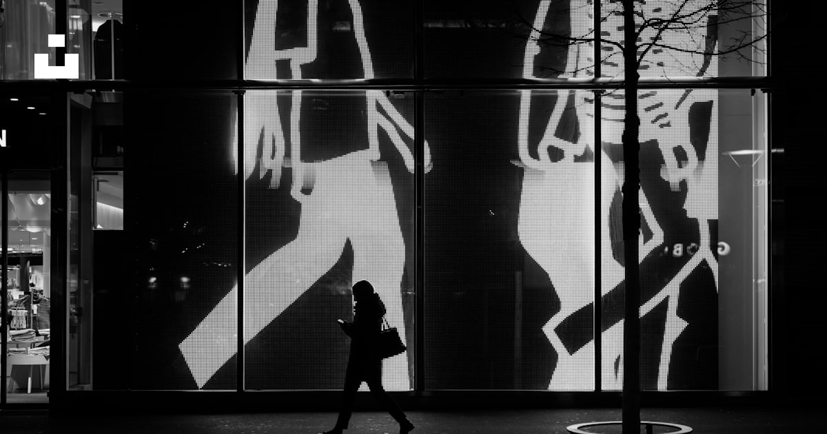 Woman walking near the gate photo – Free Black Image on Unsplash Woman walking near the gate photo – Free Black Image on Unsplash
