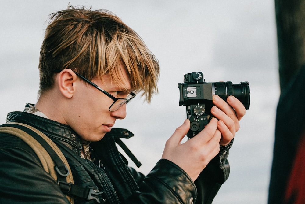 man holding camera