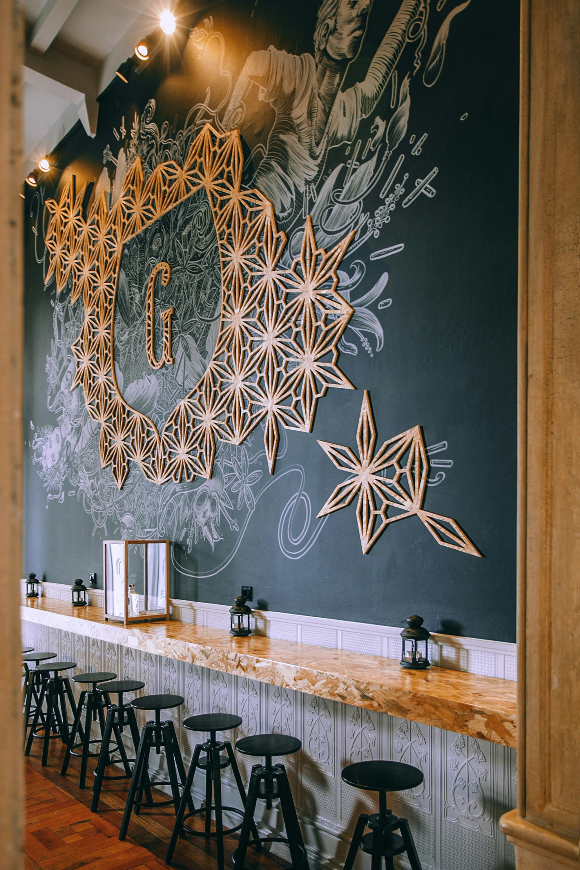 Pile of black metal bar stools photo Free Grey Image on Unsplash