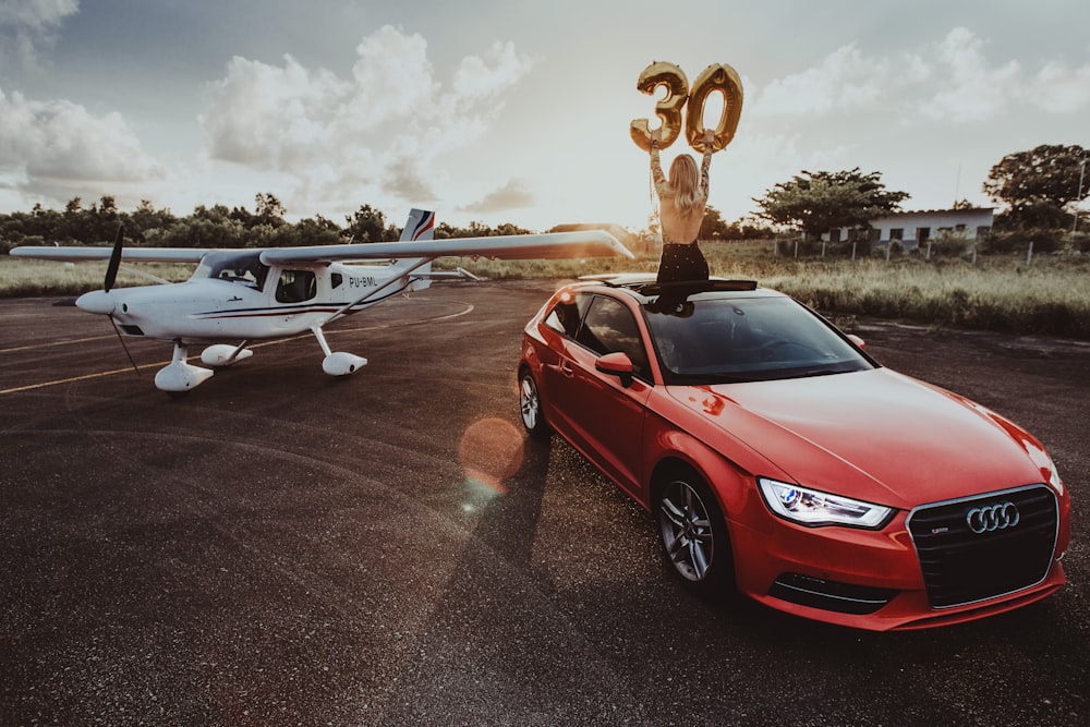 red Audi 3-door hatchback