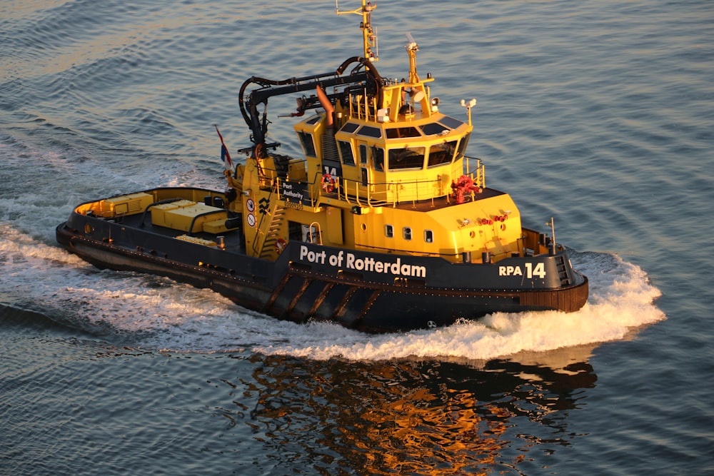 yellow and black Port of Rotterdam fishing vessel