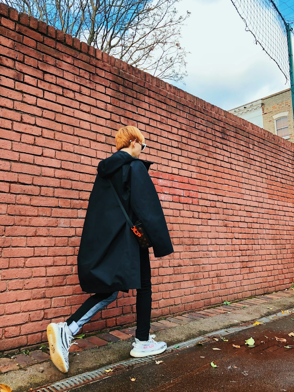 man walking on street