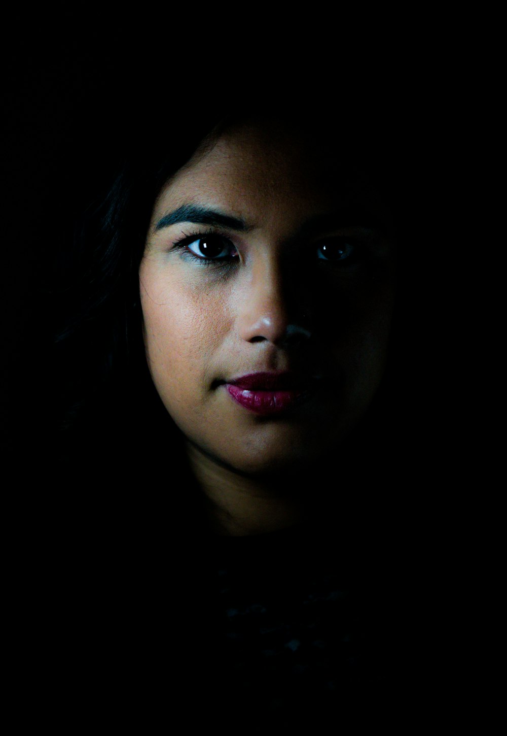 low light photography of woman