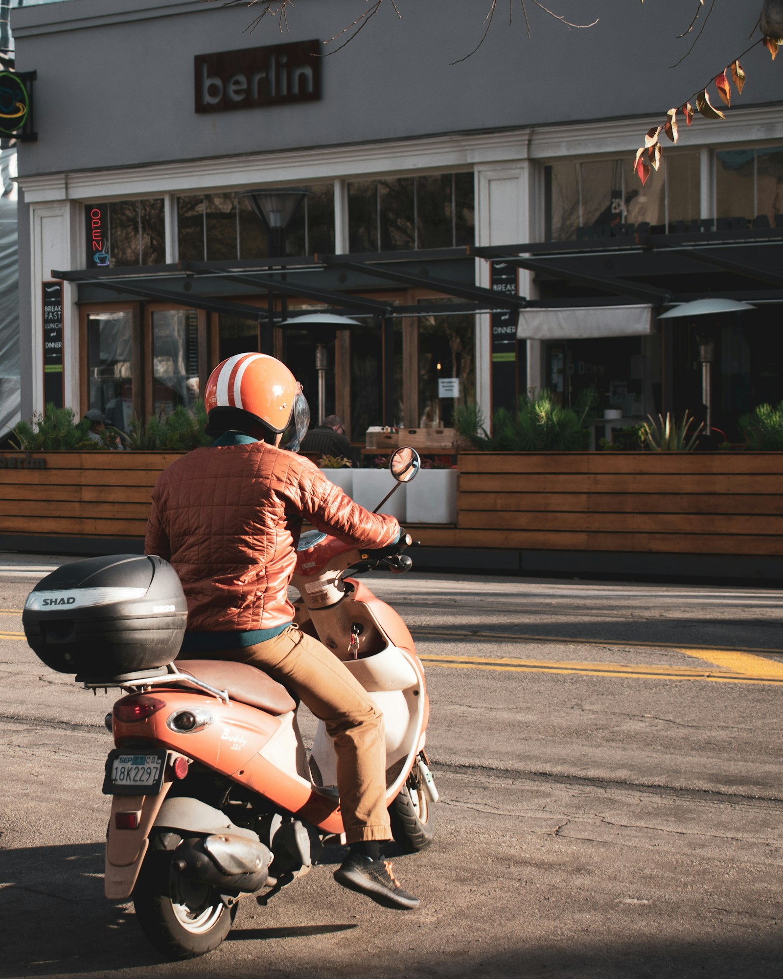 Nikon D3500 sample photo. Person riding motor scooter photography