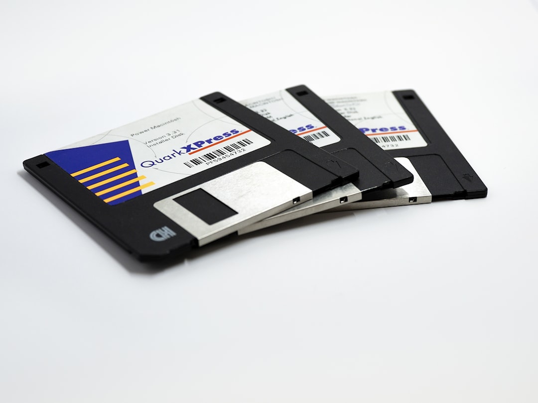 three Quad Xpress diskettes,