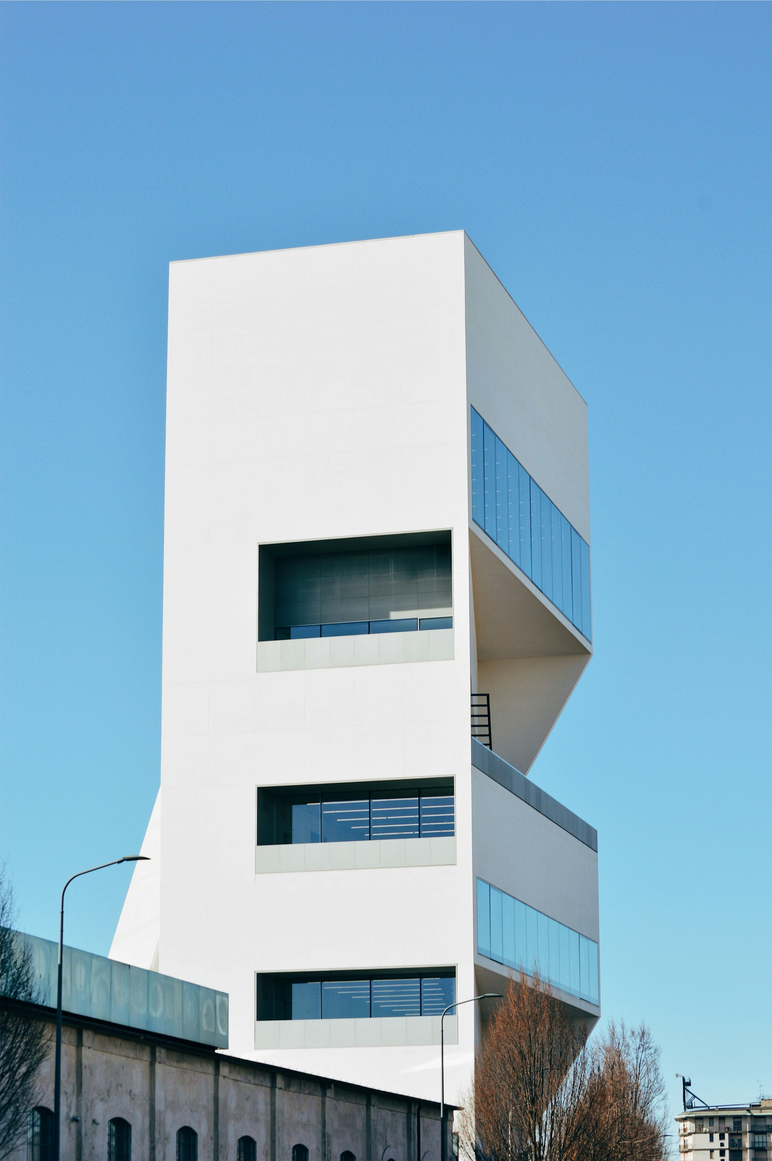 white concrete building under blue sky