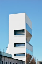 white concrete building under blue sky