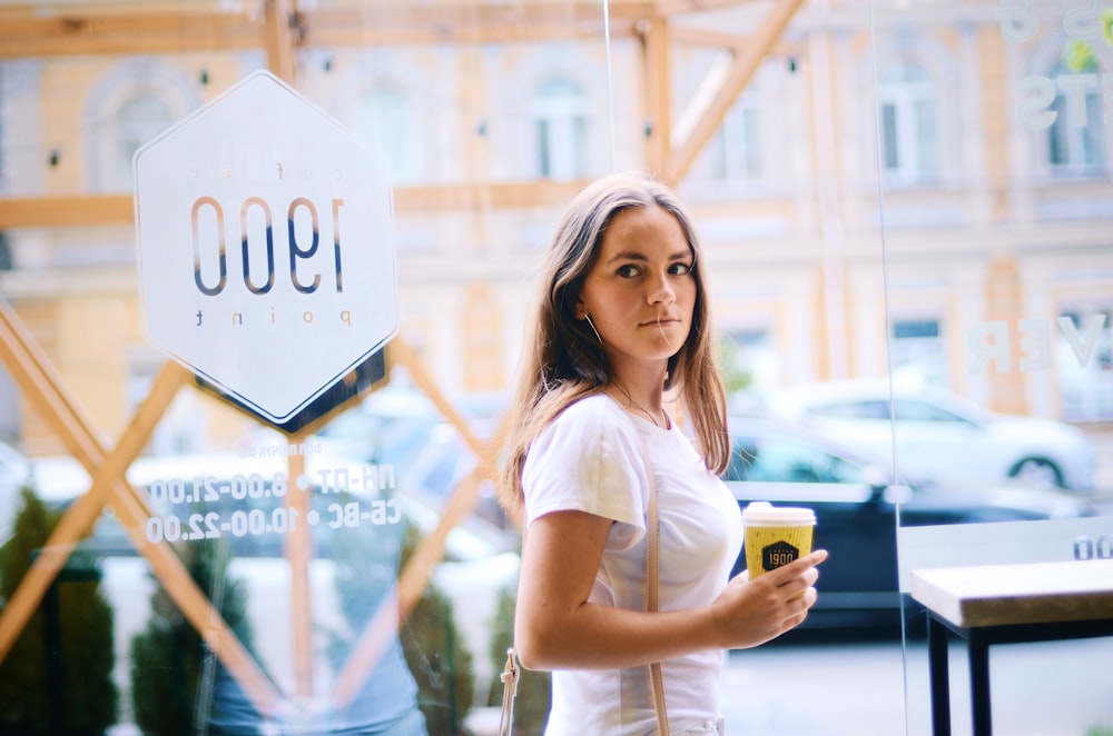 woman standing near door