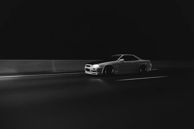 white car passing through streets