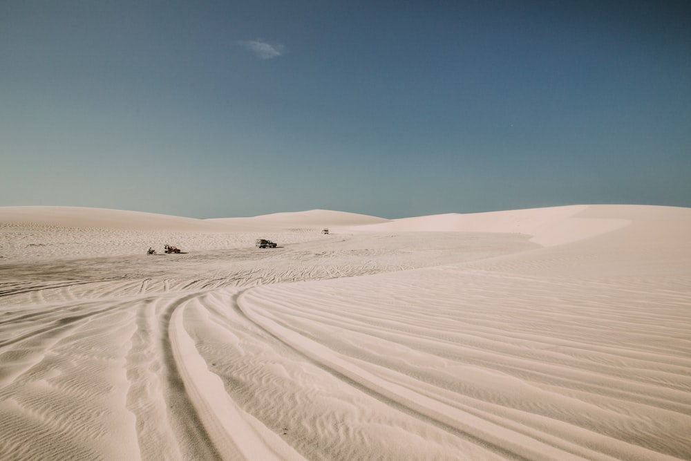 white sand under blue sky