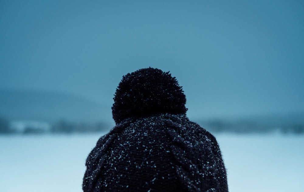 shallow focus photo of bobble hat