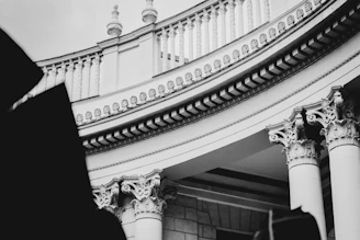 grayscale photo of concrete building