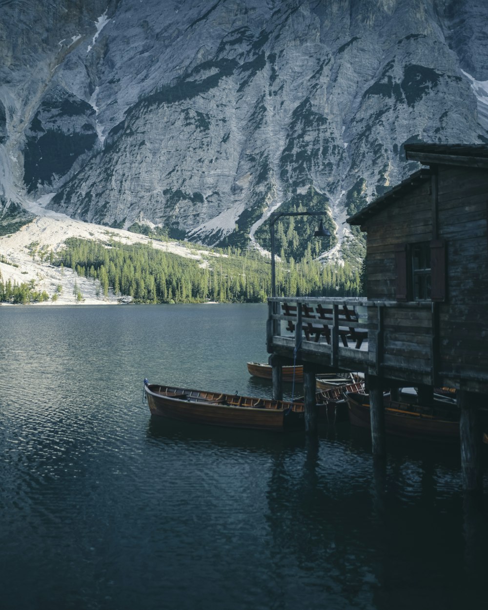 brown boat on body of water