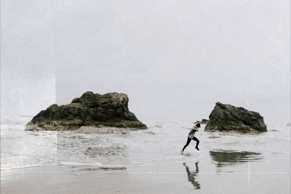 man running on beachside