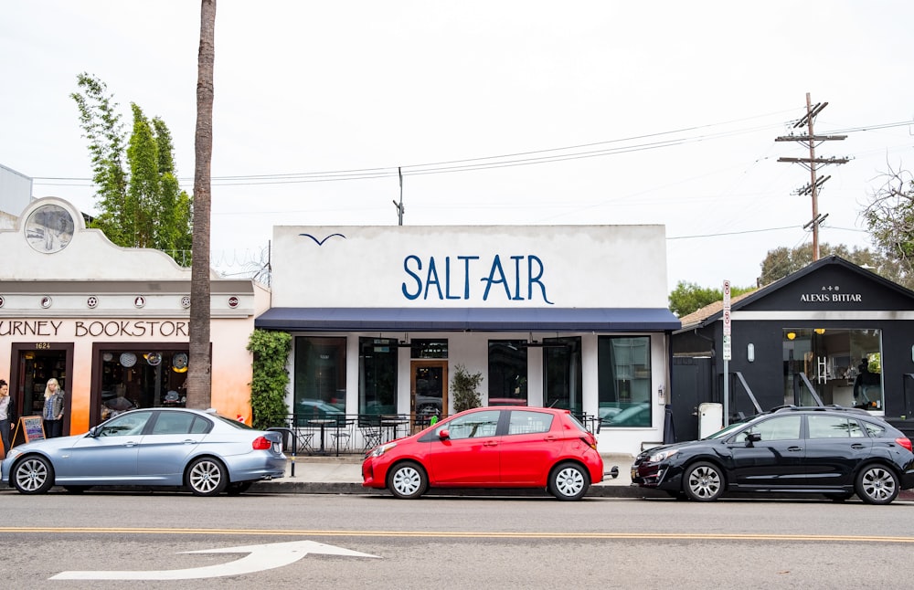 cars parked on store front