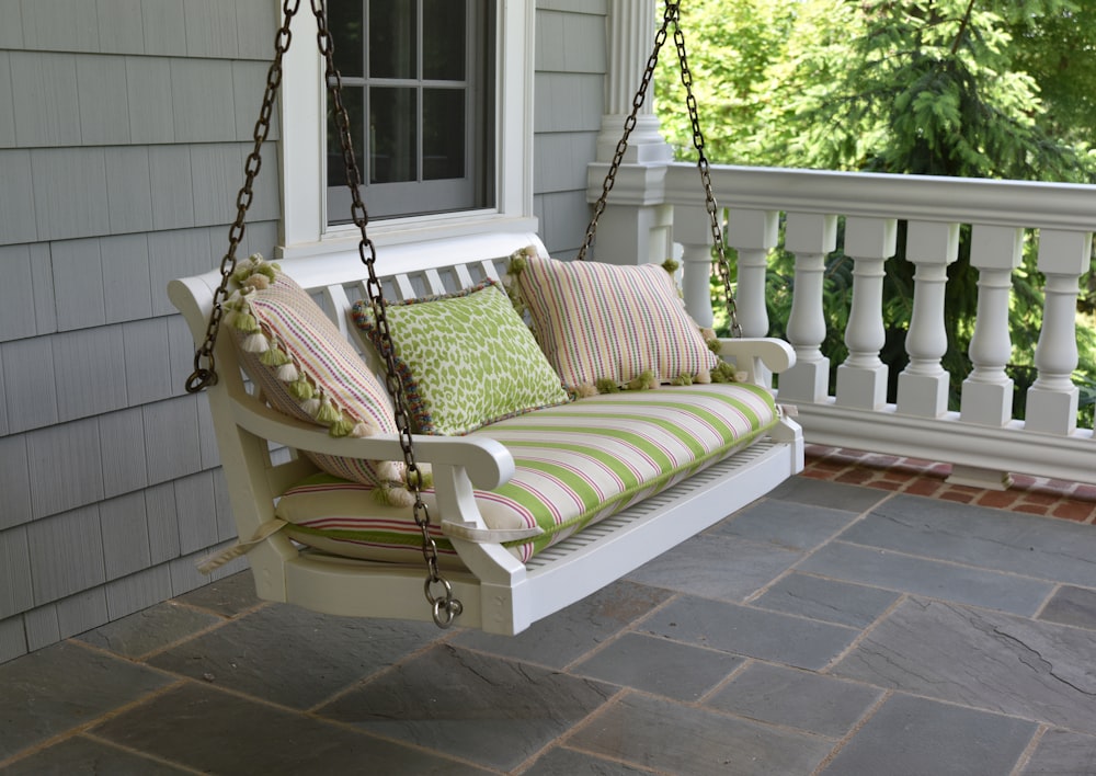 empty swing chair on porch