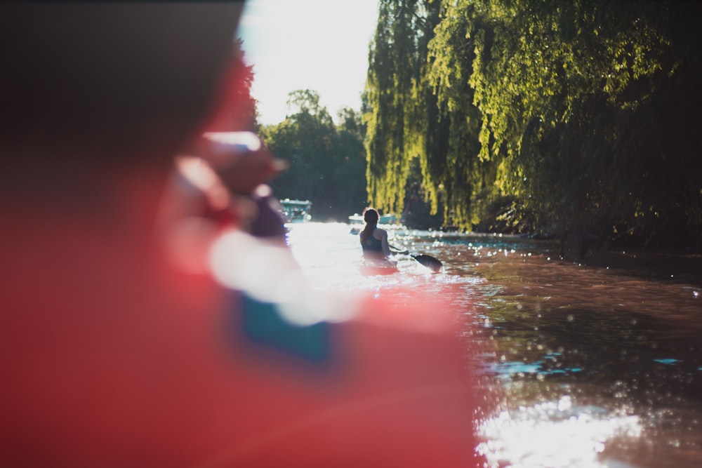 person riding kayak