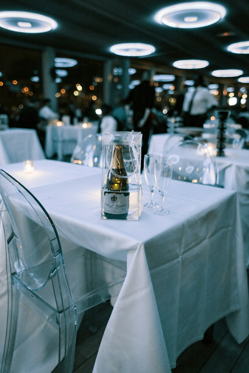white labeled bottle on table