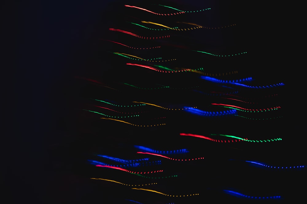 a very long exposure of colorful lights in the dark