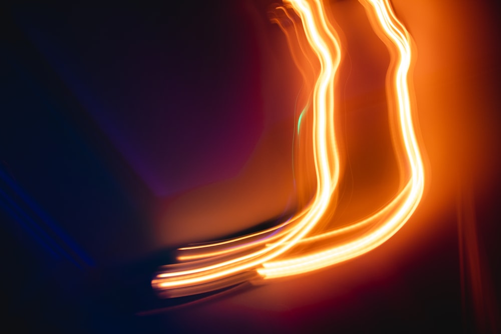 a blurry photo of a long exposure of light