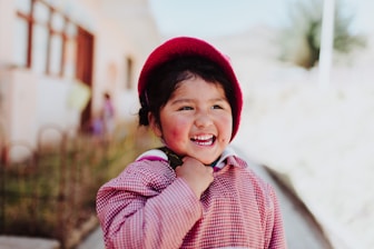 selective focus photo of smiling child