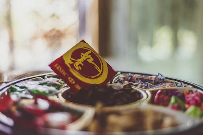 Close-up of a beautifully arranged Japanese snack hamper with traditional Lebaran decorations