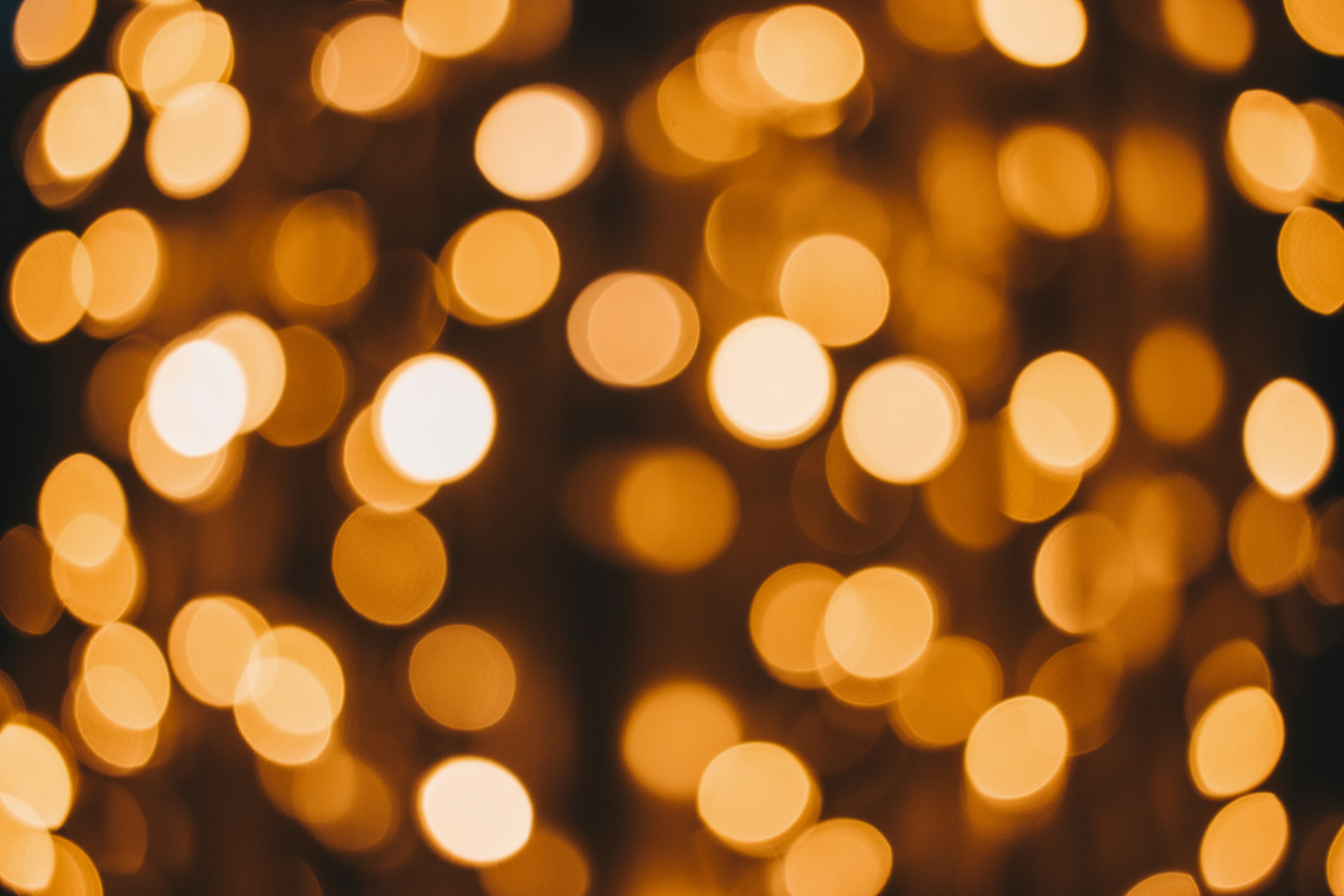 orange and black bokeh light diwali teams background