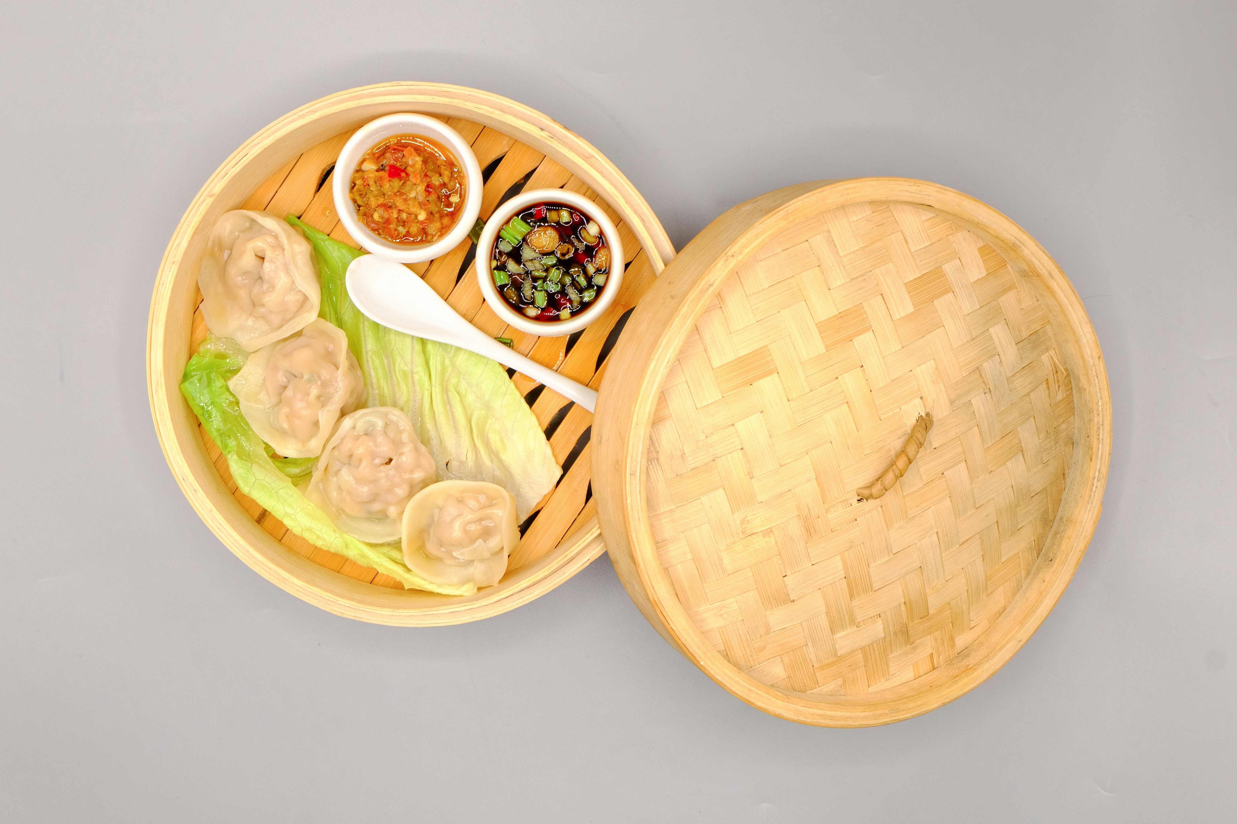 dumplings on brown wicker container