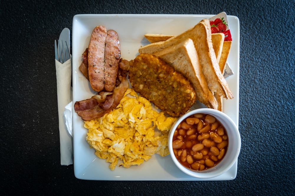 cooked food onwhite ceramic plate