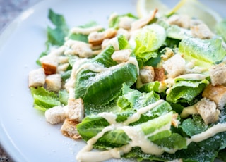 closed photography of vegetable salad with croutons in plate