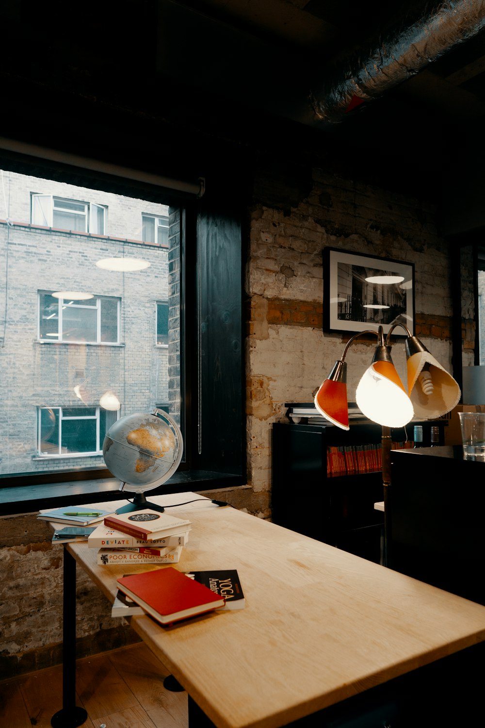 navigating desk globe on table near the window