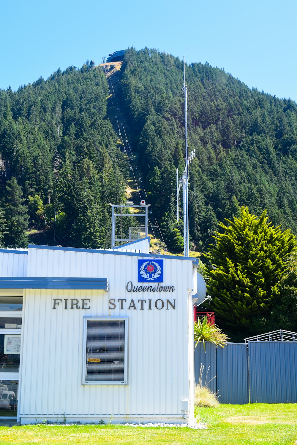 fire station surrounded by trees