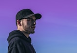 man wearing black cap