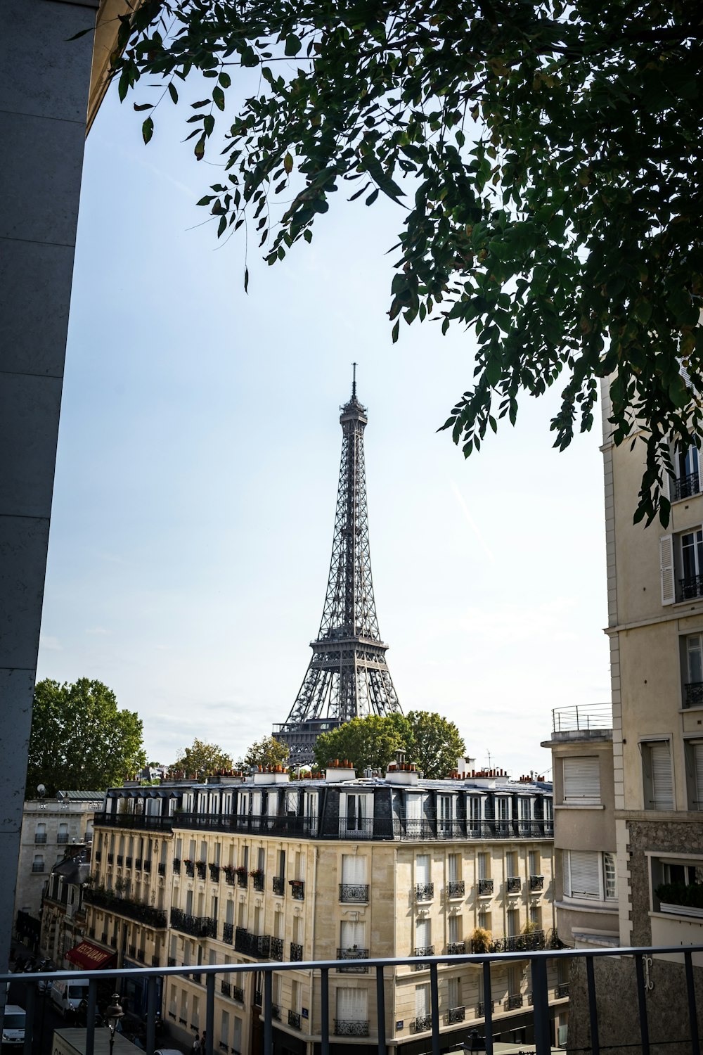 gray tower near buildings