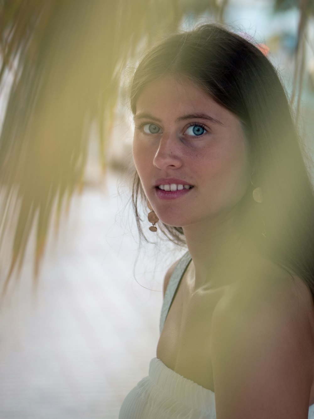 woman under coconut tree