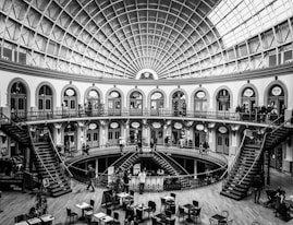 grayscale photography of building with staircase
